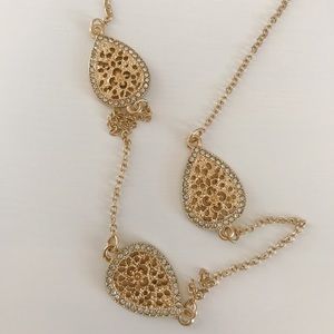 long gold necklace